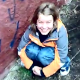 A cute, Eastern-European girl takes a shit in the grass outdoors. She wipes her ass, and then we get to see her turd on the ground.